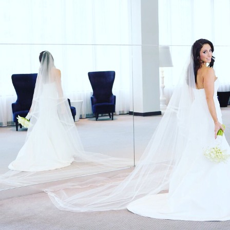 Marcelle Provencial looks beautiful in her wedding dress. 